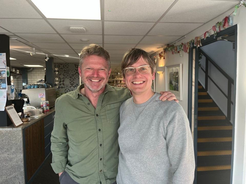Damian with illustrator Lyndon Hayes at the Cornish Craft Barn cafe